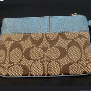 Small Coach Signature print wristlet in khaki/beige and soft blue.